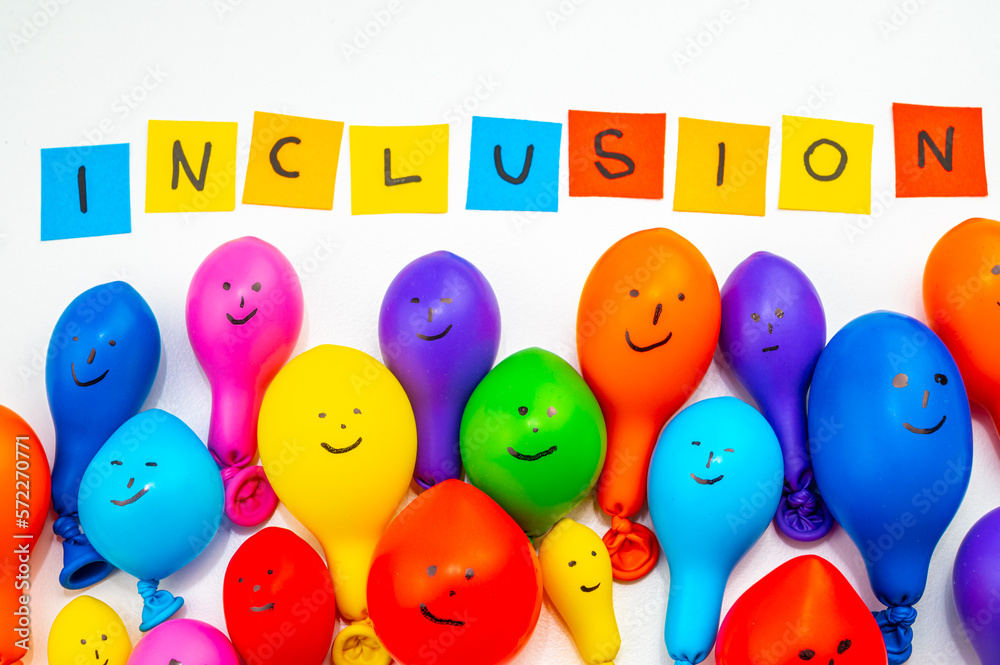 Balloons of different colors on a white surface, and text Balloons of different colors on a white surface, and text