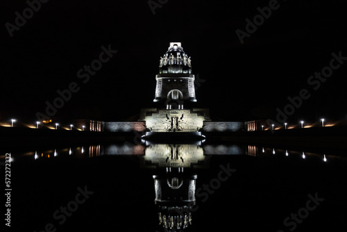 Canvas Print Night shot of the Monument to the Battle of the Nations in Leipzig, reflection on the water, symmetrical perspective, landmark and commemoration of the Battle of the Nations in 1813
