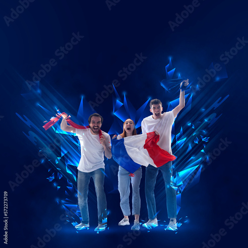 Creative art collage. Modern design. Young girl and two men emotionally cheering up favourite football team of france on championship over blue background. Sport, cup, world, team, competition