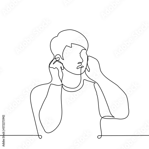 man is dissatisfied and closes his ears - one line drawing vector. concept covering ears from obnoxious loud sound
