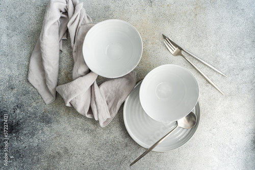Minimalistic table setting on concrete table