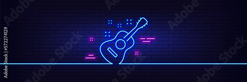 Neon light glow effect. Acoustic guitar line icon. Music sign. Musical instrument symbol. 3d line neon glow icon. Brick wall banner. Guitar outline. Vector
