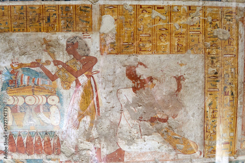 A colorful mural with the deceased in front of altar with offerings - the tomb of Neferrenpet, TT 178, Luxor Western bank