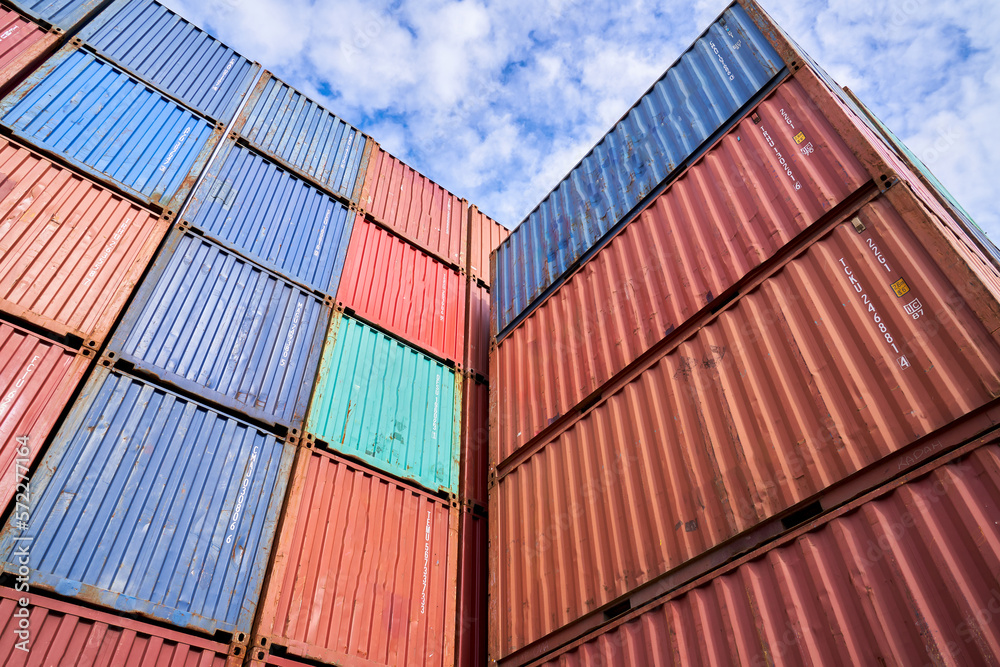 Fototapeta premium Perspective container boxes stacking in dock yard for logistic