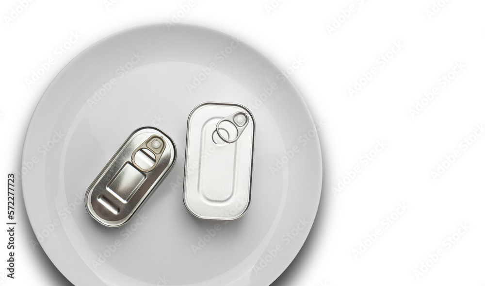 Canned fish in different sealed tin cans with easy openable lids on a white plate isolated on a transparent background. Top view Canned fish in different sealed tin cans with easy openable lids on a white plate isolated on a transparent background. Top view