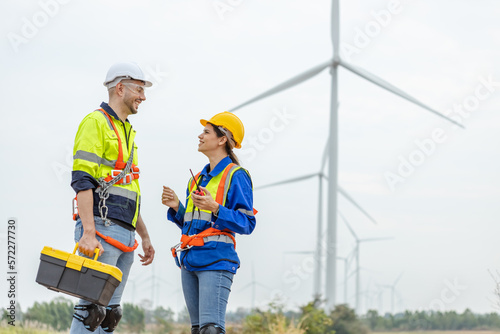 Team engineer discussed plan about renewable energy at station energy power wind. technology protect environment reduce global warming problems. Wind turbine technicians.