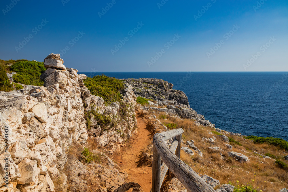 Gagliano del Capo. The beautiful panorama on the blue sea, from the rocky cliff of Salento. The nature trail that leads from the Ciolo bridge to the spectacular Cipolliane caves. Sunny day in summer.
