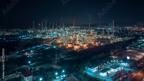 industrial area production plant or refinery crude oil and gas for transportatioon and export, aerial photography at night scene from drone, © SHUTTER DIN