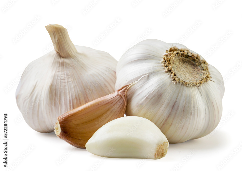 Obraz premium Garlic and cloves close-up on a white background. Isolated