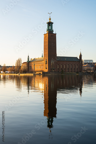 Stockholm City Hall (Stockholms stadshus) on sunny evening vertical photo with reflection