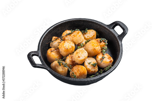 Scallops seared in garlic, thyme and butter served in cast iron skillet. Isolated, transparent background.