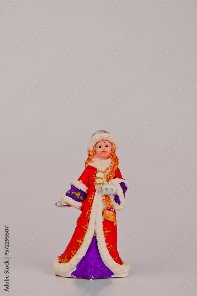 Christmas card with Santa Claus, Snow Maiden.pine and Christmas tree. cones and accessories. tinsel.A statuette of Santa Claus.Toys for the Christmas tree. Space for text.On a white background
