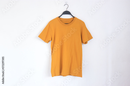yellow t shirt isolated on white