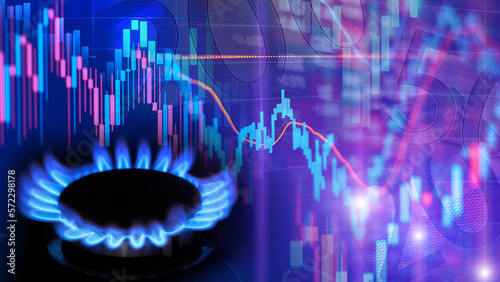 Natural gas cost growth concept with gas burners and stock charts