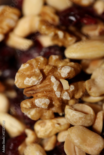 Mix of dried cranberries fruits almonds and nuts in a bowl close up modern background high quality big size stock photos prints