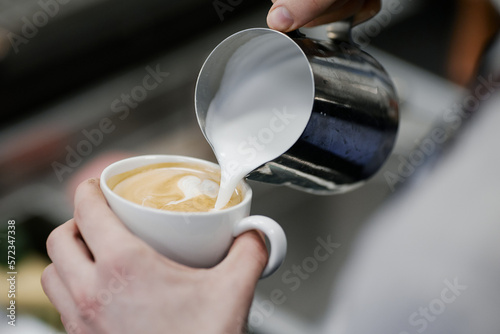 Barista makes the perfect cappuccino