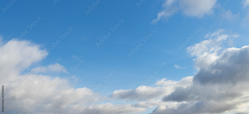 White clouds in the blue sky in sunny weather White clouds in the blue sky in sunny weather