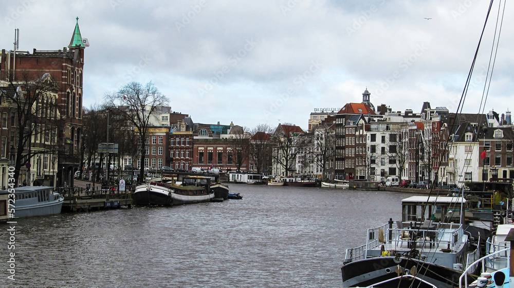 Urban landscape. Water canal in the city (Amsterdam, Netherlands)