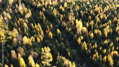 Mountain aerial, epic view. Aerial view of mountain landscape with morning fog, Tatra high mountains in the sunny morning after sunrise. Drone footage of misty forest and magical alpine scenery