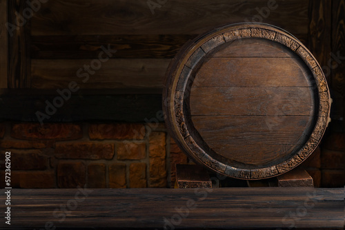 Rustic barrels for beverage in a dark wine cellar. Wooden empty surfaces for copy space  mockup  template for design of beer  wine  alcohol products  Vintage retro style background