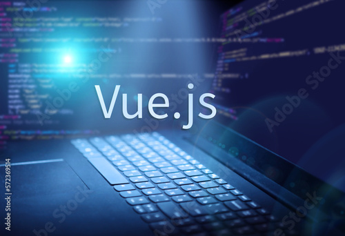 Vue.js inscription in abstract digital background. Programming language, computer courses, training.