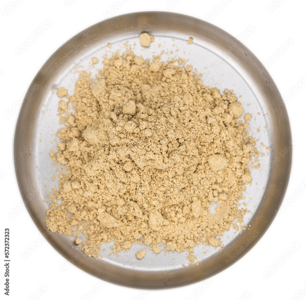 Ginger powder on transparent background. Close-up shot; selective focus. Ginger powder on transparent background. Close-up shot; selective focus.