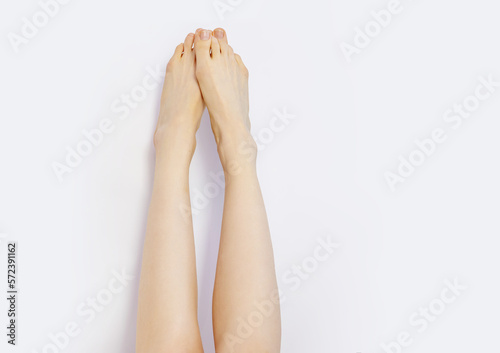 Perfect female legs. Isolated on white.