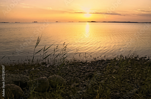 Beautiful sunset landscape in Hanko Finland seascape with rocky beach 