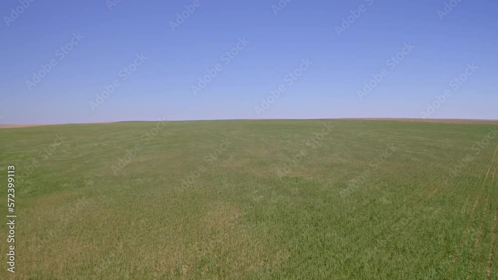 Fly above rural farmland field drone view Fly above rural farmland field drone view