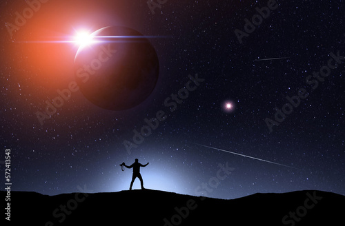 Fantasy landscape,  silhouette of a hiker standing on the full moon background.