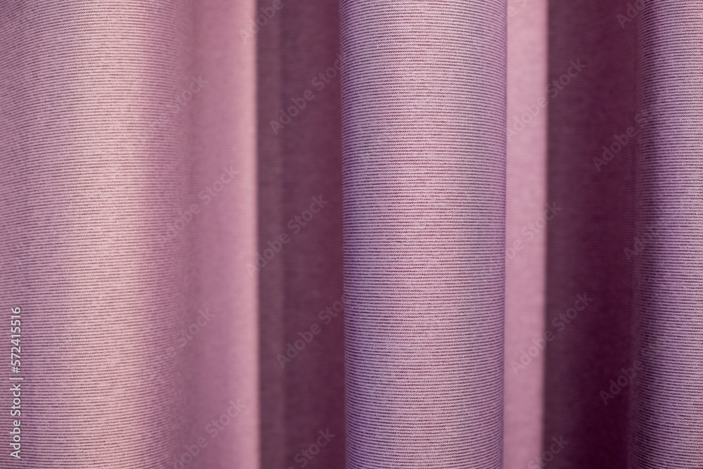 Top view of violet fabric cloth texture for background and design art work. Pink textile in fold surface backdrop.Drapery pink fabric background Top view of violet fabric cloth texture for background and design art work. Pink textile in fold surface backdrop.Drapery pink fabric background