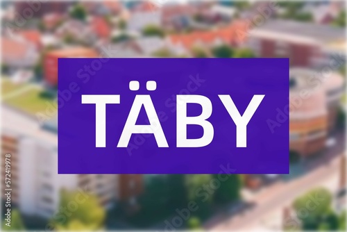 Täby: Der Name der schwedischen Stadt Täby in der Region Stockholm vor einem Hintergrundbild photo