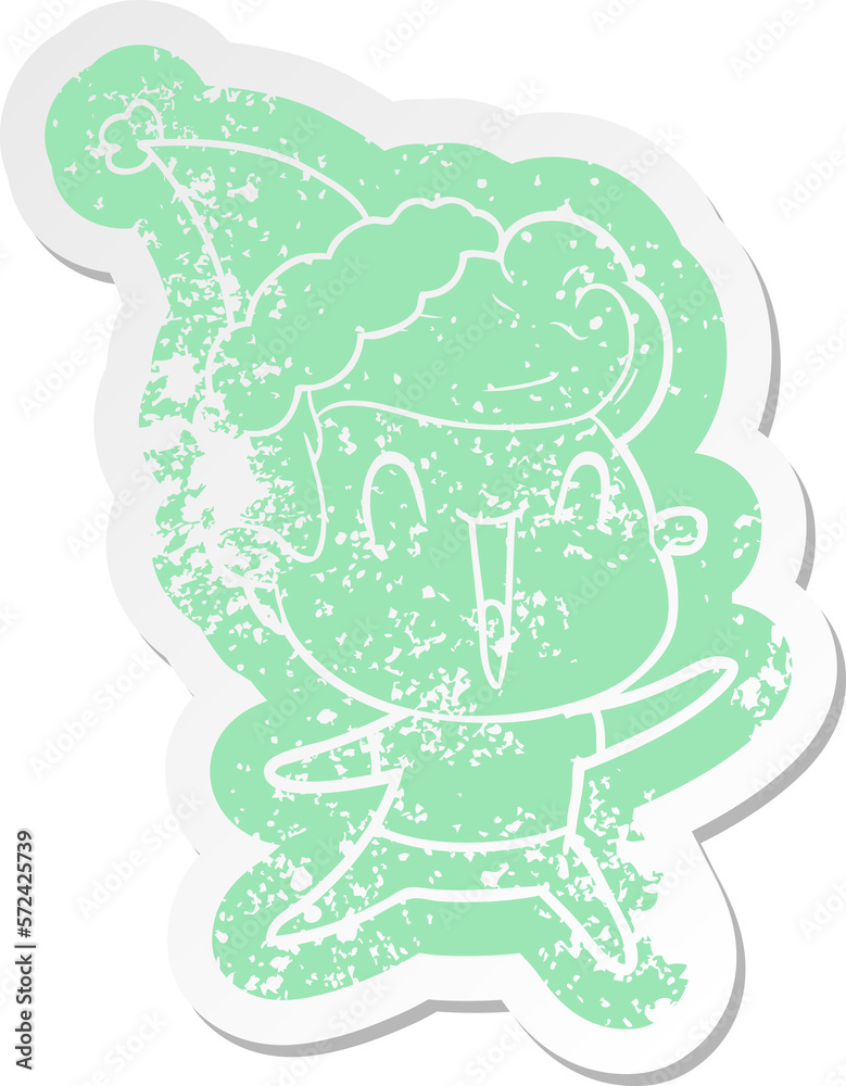 Fototapeta premium cartoon distressed sticker of a excited man wearing santa hat