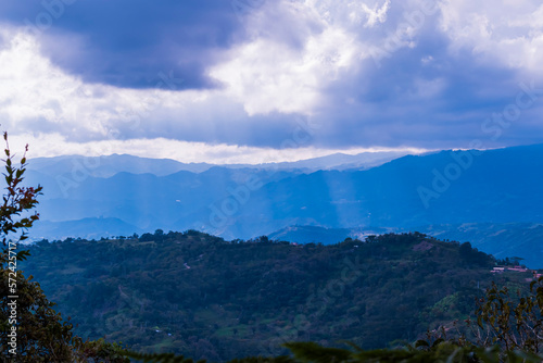 Sunbeams in a hilly landscape. Santander, Colombia.