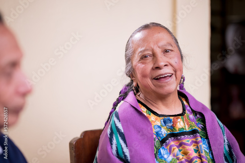 Portrait of beautiful mature woman in her traditional dress from her indigenous community. photo