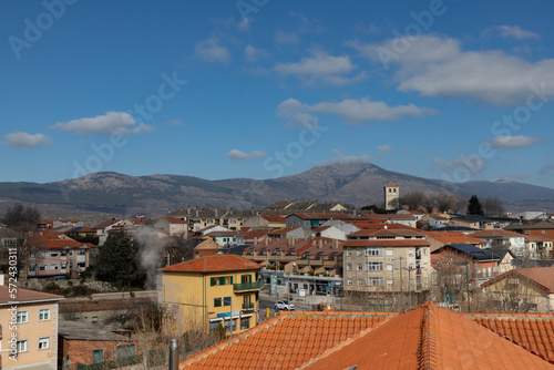 Mountain range. Snow. Mountain. Sierra de Guadarrama with white snow on the top of the mountain, where you can see the Ball of the World from the Community of Madrid on a clear day with some clouds.