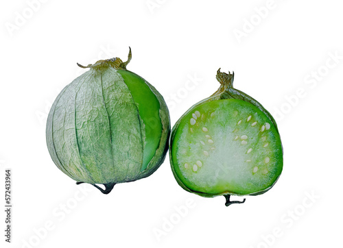 physalis philadelphica. Tomatillo or Mexican husk tomato. Fresh organic green tomatillos (Physalis philadelphica) with a husk. One whole and half isolated on white photo