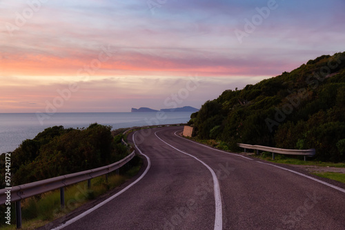 Scenic Highway on the Sea Coast during Sunny Fall Season Sunset. Sardinia, Italy. Adventure Travel