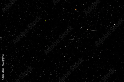 Feb 14-15 2023 the rare green comet C/2022 E3(ZTF) made its closest pass by Aldebaran. The two share the night with twin meteors. 4 sec f/1.8 ISO 1600 Sony FE 135mm f/1.8 GM Sony a7R IVA