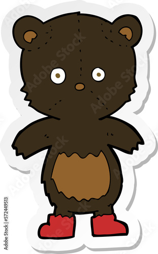 sticker of a cartoon black bear cub