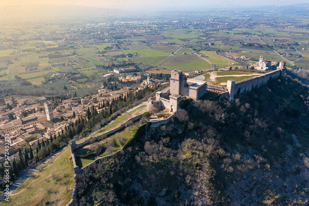 close up aerial view of the castle of assisi umbria with the city in the background
