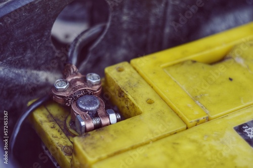 Stamp put on a yellow car battery 