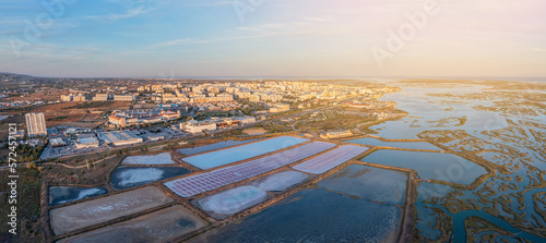 Aerial view of the Ria Formosa park with salt pans in the Portuguese city of Faro. Sunny day photo