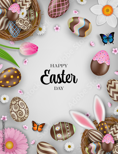 happy easter background with chocolate eggs in the nests, flowers and butterflies