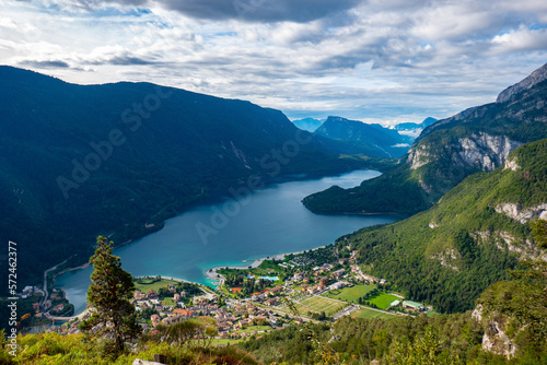 Idyllic view of beautiful Lake of Molveno  province of Trento  Trentino Alto-Adige  Italy  in a cloudy and sunny summer day  surrounded by Dolomiti del Brenta mountains
