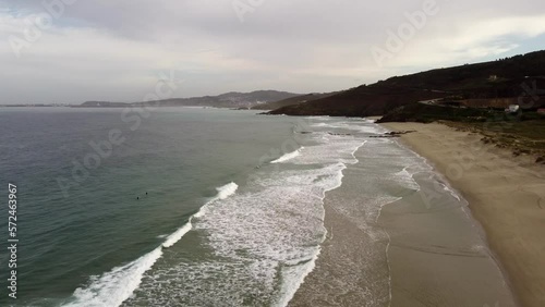 Panoramic aereal drone shot of the beach of Barranan, Galicia, Spain, on a sunny day. High quality 4k footage