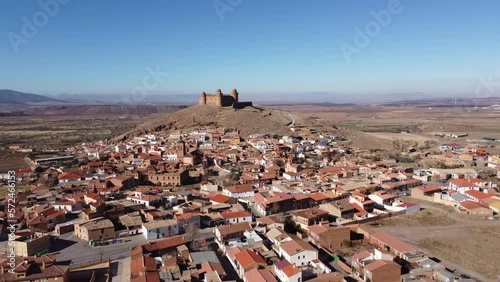 Aerial view of La Calahorra castle, showcasing its Renaissance courtyard, situated near Granada in Andalusia, Spain. This location is featured in the TV series The House of the Dragon, Pentos Castle