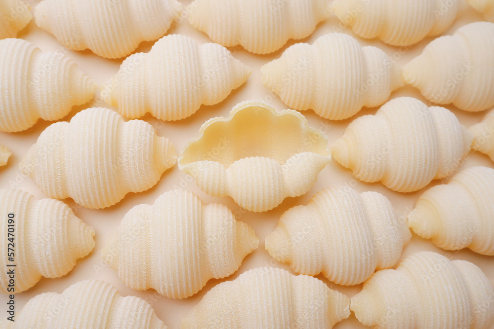 Pasta on a beige background - pattern, texture