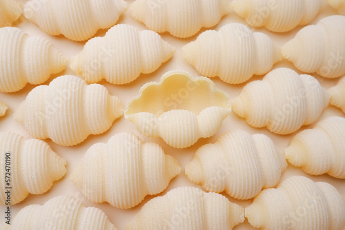 Pasta on a beige background - pattern  texture