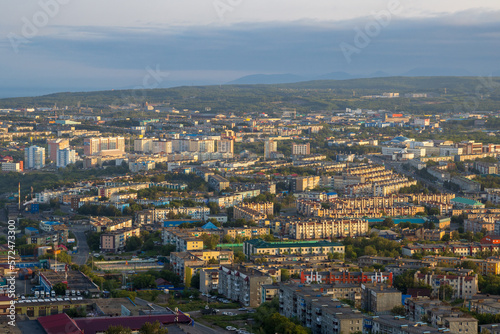 Morning cityscape. Top view of the buildings and streets of the city. Residential urban areas at sunrise. Beautiful aerial city landscape. Petropavlovsk-Kamchatsky, Kamchatka Krai, Far East of Russia. © Andrei Stepanov